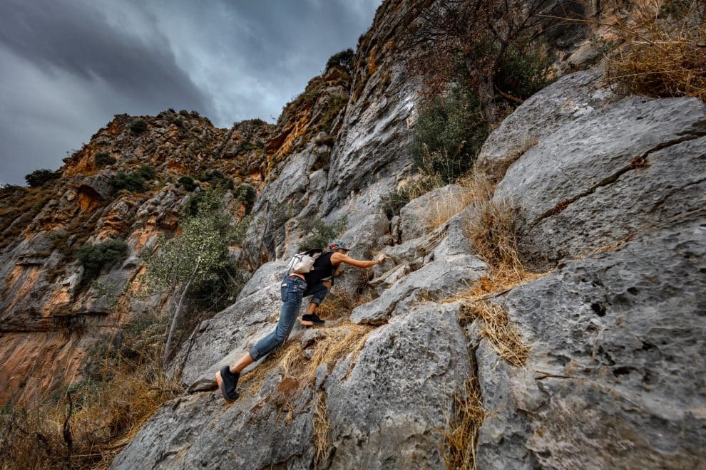 Woman-climbing-the-cliffs-2023-11-27-05-27-37-utc